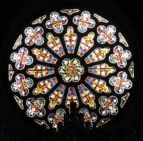 Pitmans Shorthand Christmas Carols: Stained glass rose window in Christ Church, Chislehurst, Kent