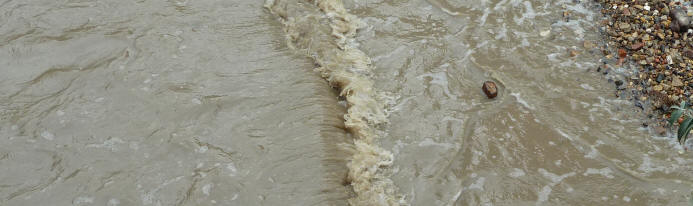 Greenwich - muddy waters of River Thames